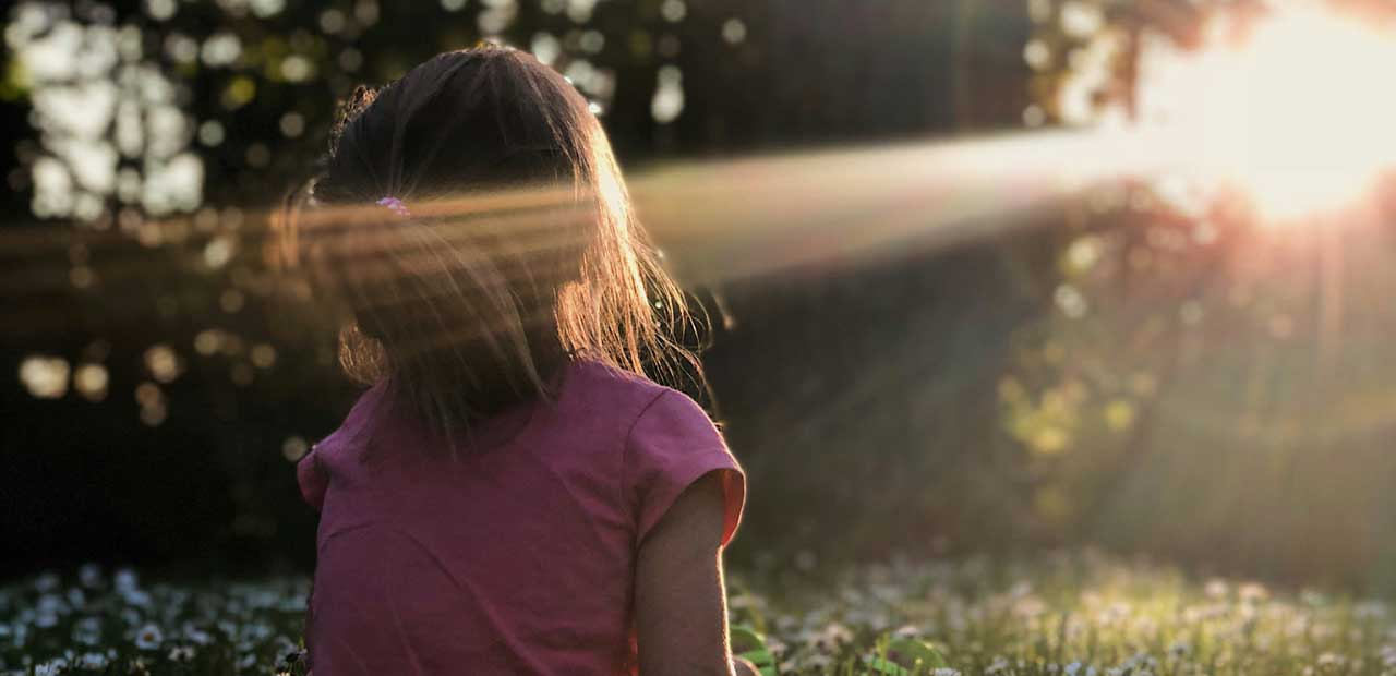 Child's face in sunlight The benefits of therapy feel like sunlight on a child's face